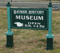 sign pointing to Bayside History Museum